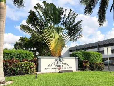 Beautifully maintained 1-bedroom, 1-bathroom condo nestled in a on Oriole Golf and Tennis Club in Florida - for sale on GolfHomes.com, golf home, golf lot