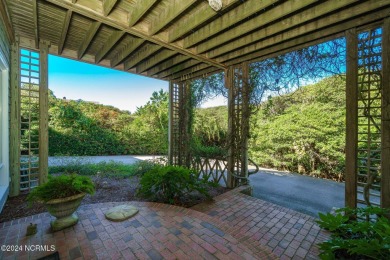 This classic, oceanfront four-bedroom home with an elevator is on The Country Club of the Crystal Coast in North Carolina - for sale on GolfHomes.com, golf home, golf lot