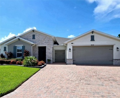 HIGHLY UPGRADED SIENA MODEL HOME 3 Bed + Den and 2 Car + GOLF on Stonegate Golf Club in Florida - for sale on GolfHomes.com, golf home, golf lot