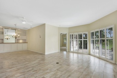 Located on the 10th hole of the Legacy Golf course, this Pine on The Legacy Golf and Tennis Club in Florida - for sale on GolfHomes.com, golf home, golf lot