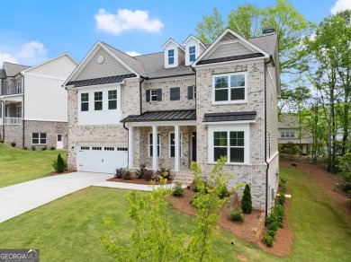 Discover luxury living in this barely lived-in gem nestled in on Traditions of Braselton Golf Club in Georgia - for sale on GolfHomes.com, golf home, golf lot