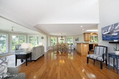 This exceptional lakefront home, located in Seven Lakes West on Beacon Ridge Golf and Country Club in North Carolina - for sale on GolfHomes.com, golf home, golf lot
