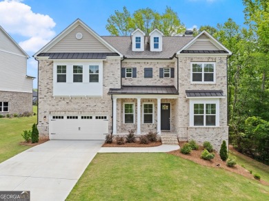 Discover luxury living in this barely lived-in gem nestled in on Traditions of Braselton Golf Club in Georgia - for sale on GolfHomes.com, golf home, golf lot