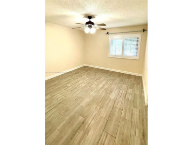Discover this beautifully upgraded 2-bedroom, 2-bath corner unit on Pine Island Ridge Country Club in Florida - for sale on GolfHomes.com, golf home, golf lot