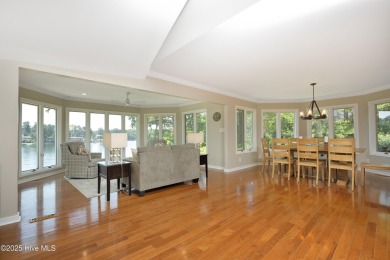 This exceptional lakefront home, located in Seven Lakes West on Beacon Ridge Golf and Country Club in North Carolina - for sale on GolfHomes.com, golf home, golf lot