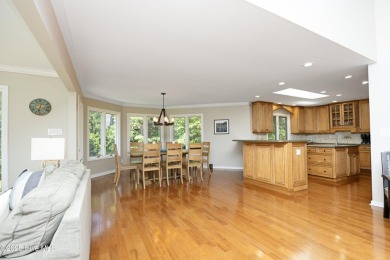 This exceptional lakefront home, located in Seven Lakes West on Beacon Ridge Golf and Country Club in North Carolina - for sale on GolfHomes.com, golf home, golf lot