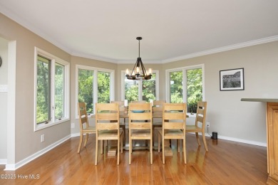 This exceptional lakefront home, located in Seven Lakes West on Beacon Ridge Golf and Country Club in North Carolina - for sale on GolfHomes.com, golf home, golf lot