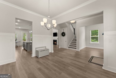 Discover luxury living in this barely lived-in gem nestled in on Traditions of Braselton Golf Club in Georgia - for sale on GolfHomes.com, golf home, golf lot