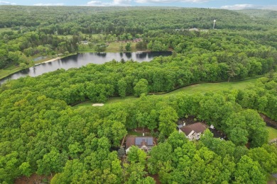 OPEN HOUSE 5/31/2025 - 11:00-1:00 Perched atop a scenic hilltop on Country Club of the Poconos Golf Course in Pennsylvania - for sale on GolfHomes.com, golf home, golf lot