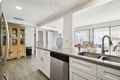 Discover this beautifully updated 3-bedroom, 2-bathroom home in on Beacon Woods Golf Club in Florida - for sale on GolfHomes.com, golf home, golf lot