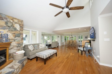 This exceptional lakefront home, located in Seven Lakes West on Beacon Ridge Golf and Country Club in North Carolina - for sale on GolfHomes.com, golf home, golf lot