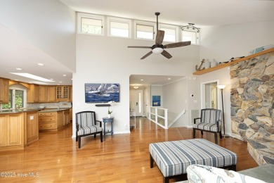 This exceptional lakefront home, located in Seven Lakes West on Beacon Ridge Golf and Country Club in North Carolina - for sale on GolfHomes.com, golf home, golf lot