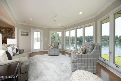 This exceptional lakefront home, located in Seven Lakes West on Beacon Ridge Golf and Country Club in North Carolina - for sale on GolfHomes.com, golf home, golf lot