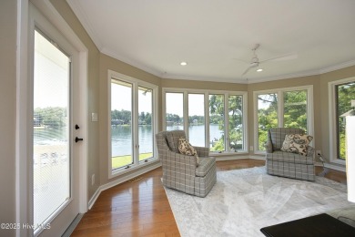 This exceptional lakefront home, located in Seven Lakes West on Beacon Ridge Golf and Country Club in North Carolina - for sale on GolfHomes.com, golf home, golf lot