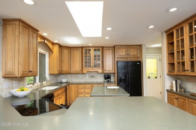This exceptional lakefront home, located in Seven Lakes West on Beacon Ridge Golf and Country Club in North Carolina - for sale on GolfHomes.com, golf home, golf lot
