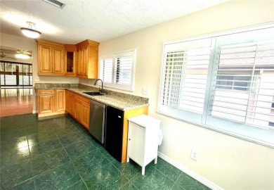 Discover this beautifully upgraded 2-bedroom, 2-bath corner unit on Pine Island Ridge Country Club in Florida - for sale on GolfHomes.com, golf home, golf lot