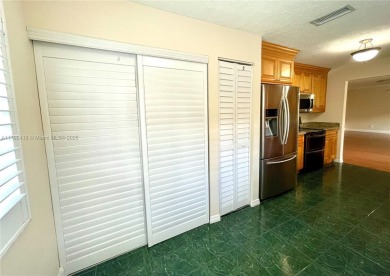 Discover this beautifully upgraded 2-bedroom, 2-bath corner unit on Pine Island Ridge Country Club in Florida - for sale on GolfHomes.com, golf home, golf lot