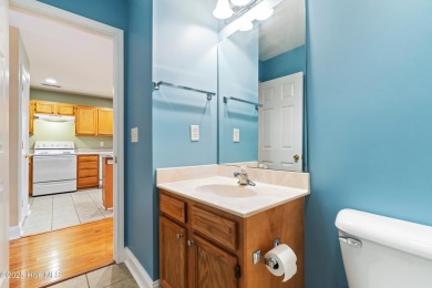 Enjoy the ease of one-level living in this low-maintenance on Masonboro Country Club in North Carolina - for sale on GolfHomes.com, golf home, golf lot