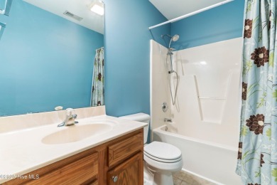 Enjoy the ease of one-level living in this low-maintenance on Masonboro Country Club in North Carolina - for sale on GolfHomes.com, golf home, golf lot