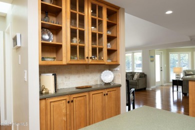 This exceptional lakefront home, located in Seven Lakes West on Beacon Ridge Golf and Country Club in North Carolina - for sale on GolfHomes.com, golf home, golf lot