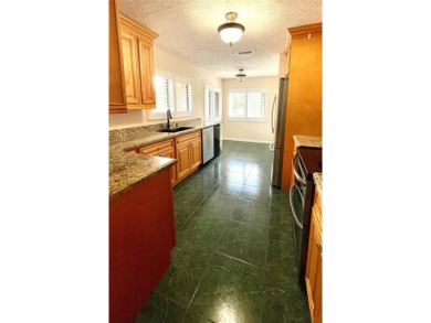 Discover this beautifully upgraded 2-bedroom, 2-bath corner unit on Pine Island Ridge Country Club in Florida - for sale on GolfHomes.com, golf home, golf lot