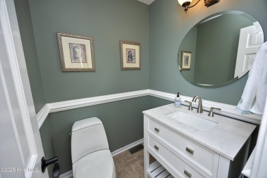 This exceptional lakefront home, located in Seven Lakes West on Beacon Ridge Golf and Country Club in North Carolina - for sale on GolfHomes.com, golf home, golf lot