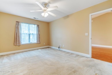 Enjoy the ease of one-level living in this low-maintenance on Masonboro Country Club in North Carolina - for sale on GolfHomes.com, golf home, golf lot