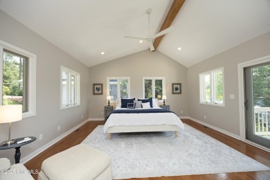 This exceptional lakefront home, located in Seven Lakes West on Beacon Ridge Golf and Country Club in North Carolina - for sale on GolfHomes.com, golf home, golf lot