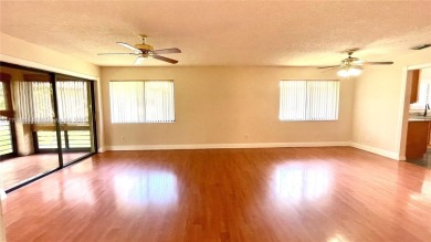 Discover this beautifully upgraded 2-bedroom, 2-bath corner unit on Pine Island Ridge Country Club in Florida - for sale on GolfHomes.com, golf home, golf lot