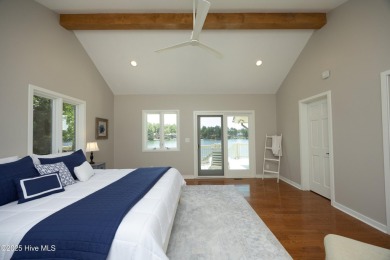 This exceptional lakefront home, located in Seven Lakes West on Beacon Ridge Golf and Country Club in North Carolina - for sale on GolfHomes.com, golf home, golf lot