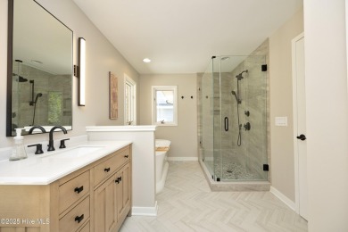 This exceptional lakefront home, located in Seven Lakes West on Beacon Ridge Golf and Country Club in North Carolina - for sale on GolfHomes.com, golf home, golf lot