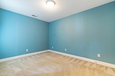 Enjoy the ease of one-level living in this low-maintenance on Masonboro Country Club in North Carolina - for sale on GolfHomes.com, golf home, golf lot