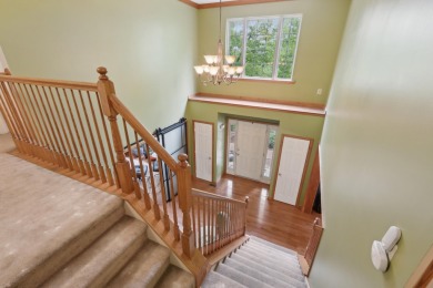 OPEN HOUSE 5/31/2025 - 11:00-1:00 Perched atop a scenic hilltop on Country Club of the Poconos Golf Course in Pennsylvania - for sale on GolfHomes.com, golf home, golf lot