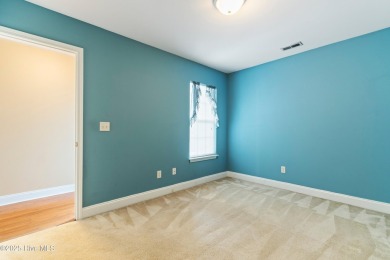 Enjoy the ease of one-level living in this low-maintenance on Masonboro Country Club in North Carolina - for sale on GolfHomes.com, golf home, golf lot
