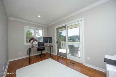 This exceptional lakefront home, located in Seven Lakes West on Beacon Ridge Golf and Country Club in North Carolina - for sale on GolfHomes.com, golf home, golf lot
