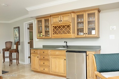 This exceptional lakefront home, located in Seven Lakes West on Beacon Ridge Golf and Country Club in North Carolina - for sale on GolfHomes.com, golf home, golf lot
