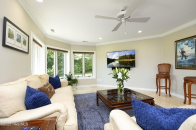 This exceptional lakefront home, located in Seven Lakes West on Beacon Ridge Golf and Country Club in North Carolina - for sale on GolfHomes.com, golf home, golf lot