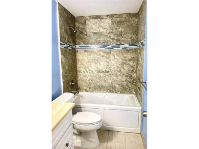 Discover this beautifully upgraded 2-bedroom, 2-bath corner unit on Pine Island Ridge Country Club in Florida - for sale on GolfHomes.com, golf home, golf lot