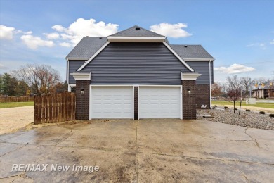 This stunning 5 bedroom home on the golf course at Saginaw on Saginaw Country Club in Michigan - for sale on GolfHomes.com, golf home, golf lot