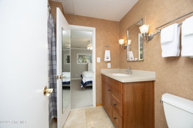 This exceptional lakefront home, located in Seven Lakes West on Beacon Ridge Golf and Country Club in North Carolina - for sale on GolfHomes.com, golf home, golf lot