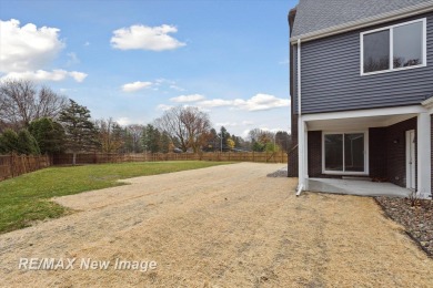 This stunning 5 bedroom home on the golf course at Saginaw on Saginaw Country Club in Michigan - for sale on GolfHomes.com, golf home, golf lot