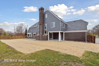 This stunning 5 bedroom home on the golf course at Saginaw on Saginaw Country Club in Michigan - for sale on GolfHomes.com, golf home, golf lot