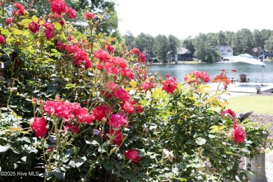 This exceptional lakefront home, located in Seven Lakes West on Beacon Ridge Golf and Country Club in North Carolina - for sale on GolfHomes.com, golf home, golf lot