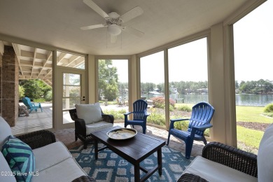 This exceptional lakefront home, located in Seven Lakes West on Beacon Ridge Golf and Country Club in North Carolina - for sale on GolfHomes.com, golf home, golf lot
