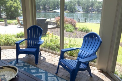 This exceptional lakefront home, located in Seven Lakes West on Beacon Ridge Golf and Country Club in North Carolina - for sale on GolfHomes.com, golf home, golf lot