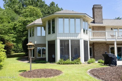 This exceptional lakefront home, located in Seven Lakes West on Beacon Ridge Golf and Country Club in North Carolina - for sale on GolfHomes.com, golf home, golf lot