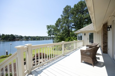 This exceptional lakefront home, located in Seven Lakes West on Beacon Ridge Golf and Country Club in North Carolina - for sale on GolfHomes.com, golf home, golf lot