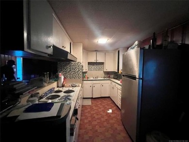 SELLER IS ENTERTAINING BACK-UP OFFERS.  MULTI-OFFER SITUATION on Lake Murray State Park Golf Course in Oklahoma - for sale on GolfHomes.com, golf home, golf lot