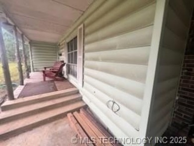 SELLER IS ENTERTAINING BACK-UP OFFERS.  MULTI-OFFER SITUATION on Lake Murray State Park Golf Course in Oklahoma - for sale on GolfHomes.com, golf home, golf lot