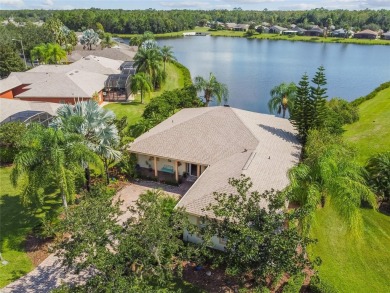 Under contract-accepting backup offers. Stunning WATERFRONT on Stonegate Golf Club in Florida - for sale on GolfHomes.com, golf home, golf lot